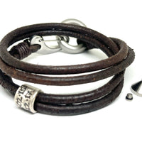 Brown leather wrap bracelet, personalised with silver beads and a stainless steel urn.